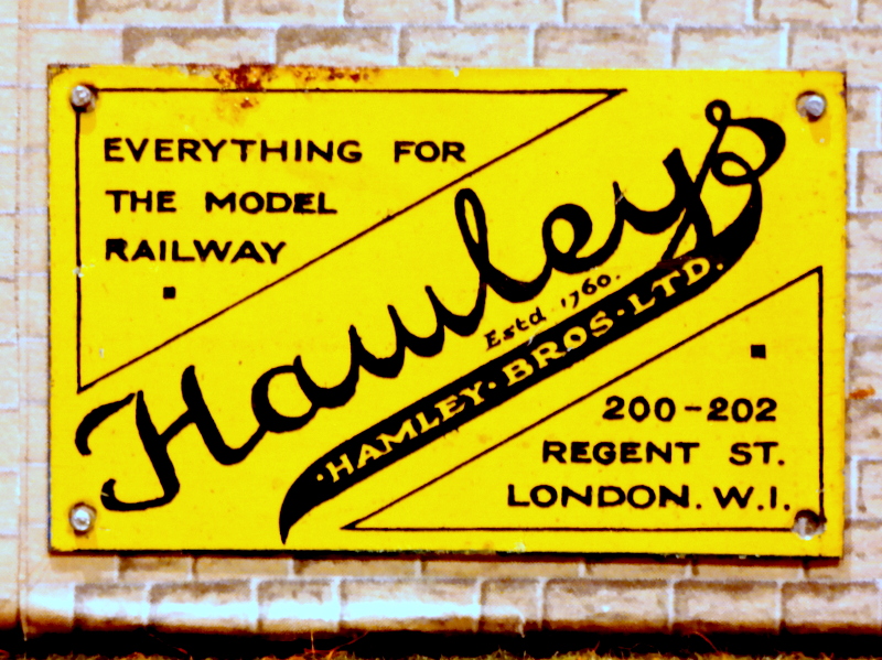 File:Hamleys, enamelled tinplate miniature poster.jpg