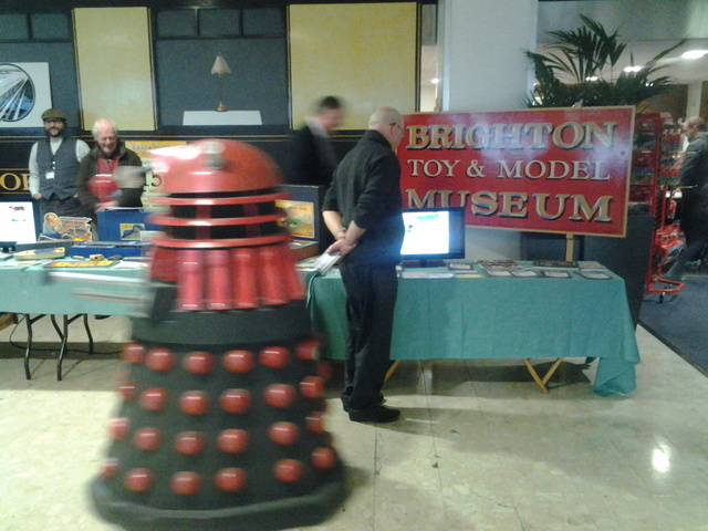 File:ModelWorld 2013, BTMM stand with passing Dalek.jpg