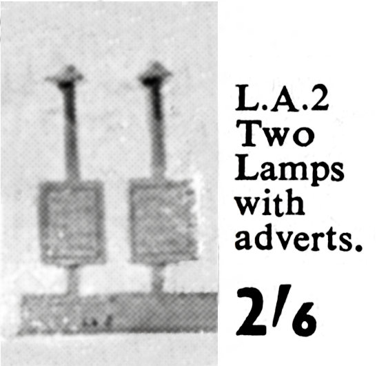 File:Two Lamps with Adverts, Wardie Master Models LA2 (Gamages 1959).jpg