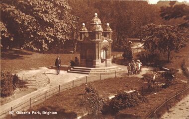 Undated postcard from the same series, apparently showing a stepped water feature flowing through the park past the Drinking Fountain,