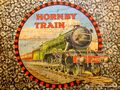 Hornby Trains, Flying Scotsman 4472 box artwork, round sticker (Meccano Ltd).jpg