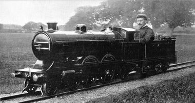 James Mackenzie at the controls of a fifteen-inch-gauge steam locomotive