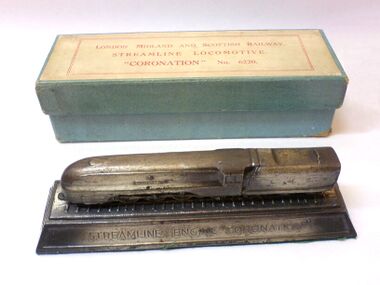LMS paperweight of the Coronation Scot, side view, with box