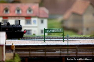 Station signage commemorating Peter Lonsdale, 00-gauge East Sussex Countryside model railway layout