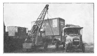 1929: Crane loading a GWR container onto a GWR lorry
