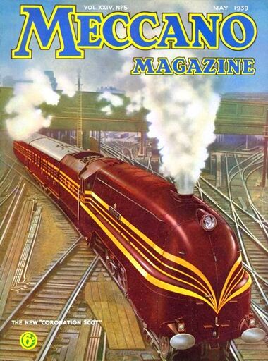 1939: Front cover of Meccano Magazine, showing the red 1939 Coronation Scot on UK track, on its way to the docks to be shipped to the US. This image is based on an LMS publicity photo: the locomotive has been fitted with a headlight, but (due to smaller clearances on US lines, has not yet been fitted with its bell, which was attached when it reached the other side of the Atlantic)