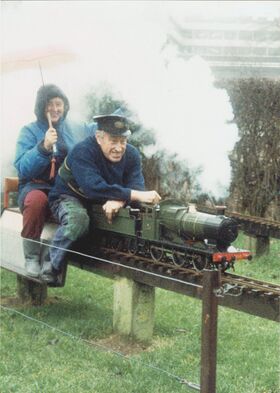 Michael and Audrey Gilkes at Hove Park, riding locomotive GWR 2253 (now on display at Brighton Toy and Model Museum