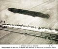 A Zeppelin racing an express train (WBoA 4ed 1920).jpg