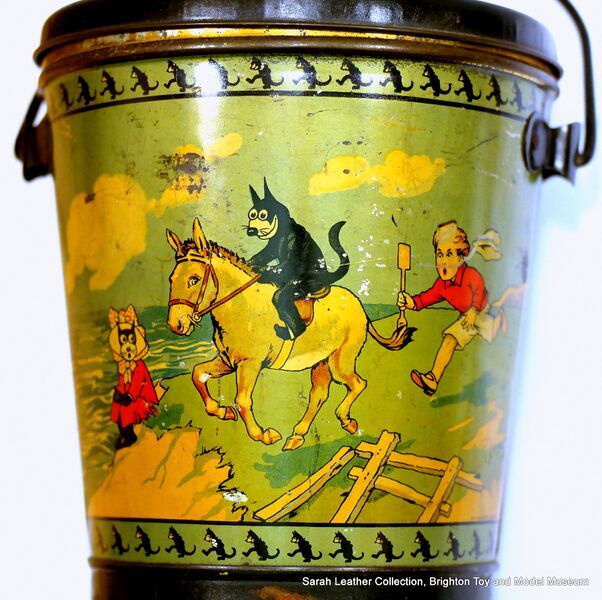 File:Felix the Cat seaside bucket, donkey ride scene (1920s).jpg