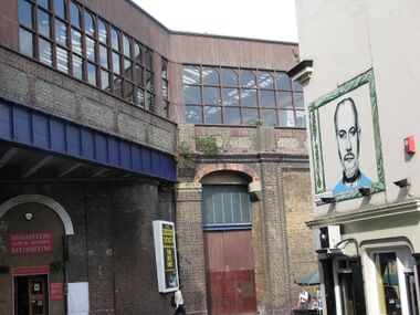 The previous mural of DJ John Peel watches over the entrance to Brighton Toy and Model Museum, 2011)