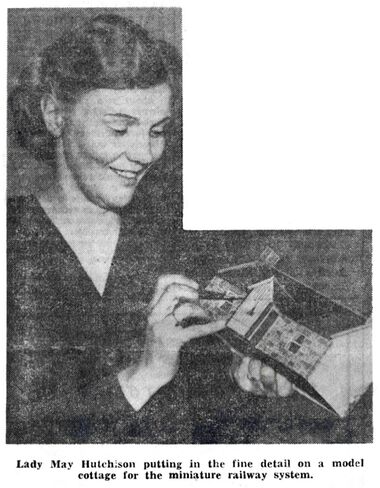 1950: "Lady May Hutchison putting in the fine detail on a model cottage for the miniature railway system", Sunday Mail, 30th April