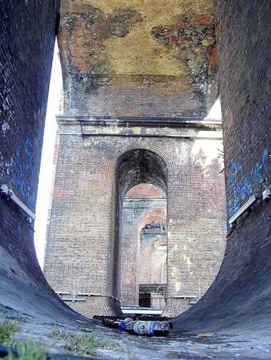 View through the pierced arches of London Road Viaduct, showing the structure's curve. Photo taken by a museum volunteer.
