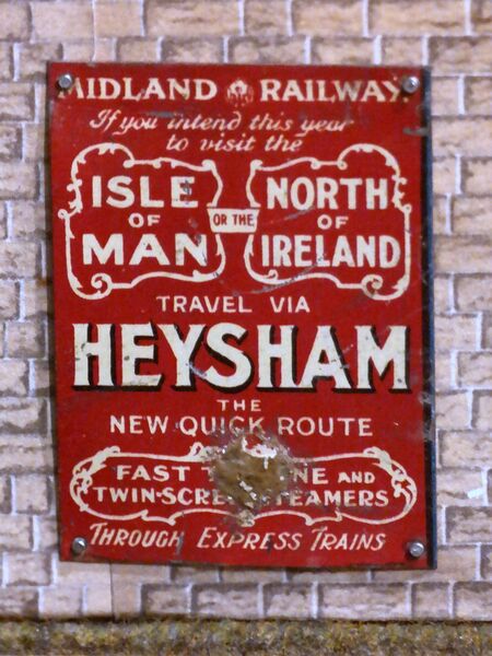 File:Midland Railway travel via Heysham, enamelled tinplate miniature poster.jpg