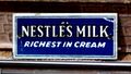 Nestles Milk, enamelled tinplate miniature poster.jpg