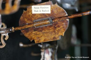 "Period Furniture" / "Made in England" label on the back of a Queen Anne Series fire shield