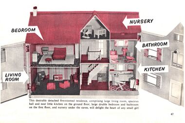 The dollhouse, doors open, displaying interior room layout