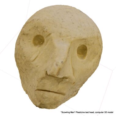 The Scowling Man: final computer model (cropped screenshot). Note the helpful embedded dust-fibres. Although this view looks not half bad as a recreation of the head, it's misleading, as a lot of the visual cues as to the shape are being provided by the shading of the photographic overlay: the "cut" mouth is obvious in this view as a dark line, but isn't satisfactorily expressed in the underlying 3D mesh.