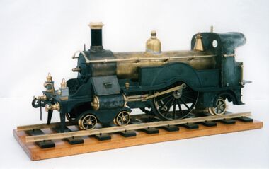 The model after restoration and refinishing, with replacement parts, awaiting repainting ME
