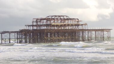 Wreck of the West Pier, catching sunlight